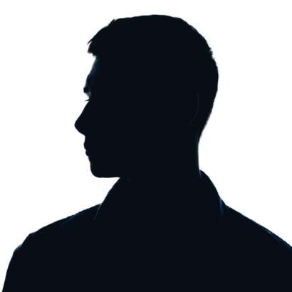 Silhouette of a man in profile view against a bright white background, creating a moody atmosphere.